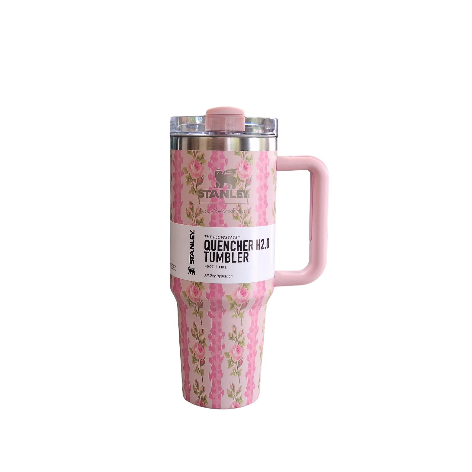 Pink floral Stanley tumbler with handle on a white background